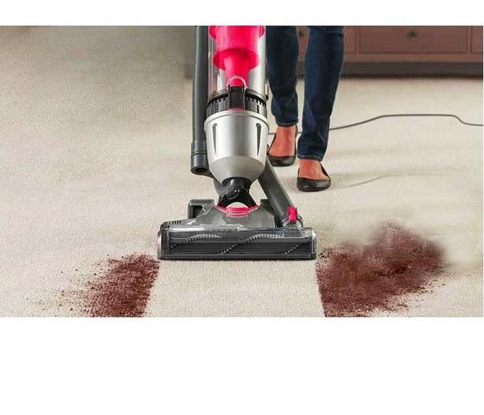 Carpet Cleaning in NJ, Professional Carpet Cleaning in NJ - image of someone cleaning a carpet